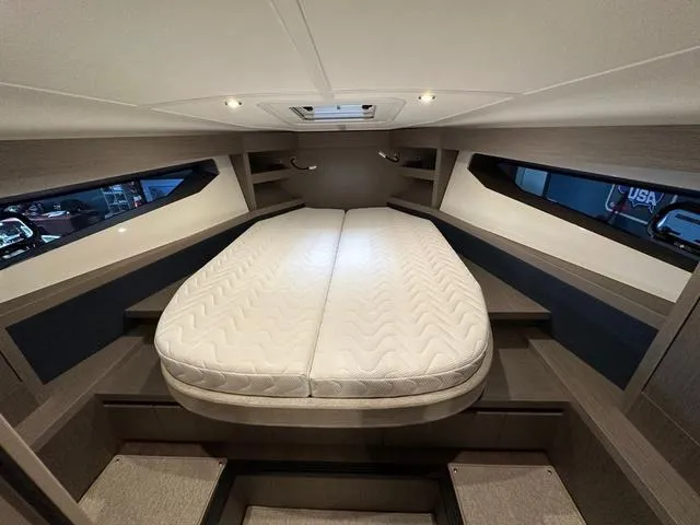 Slide: The Image of Luxurious cabin interior of 2024 Beneteau Gran Turismo 41 yacht with comfortable bed. - 30