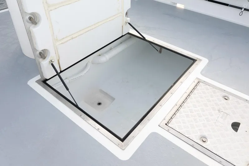 Slide: The Image of Open hatch on 2023 Millennium Marine NuWave 37 boat deck. - 28
