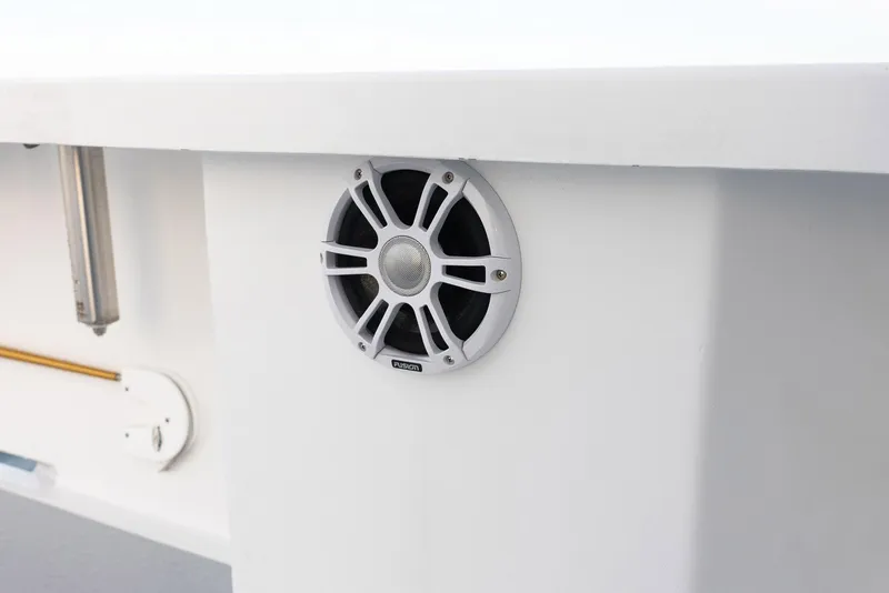 Slide: The Image of Millennium Marine NuWave 37 boat speaker, 2023 model, mounted on white surface. - 31