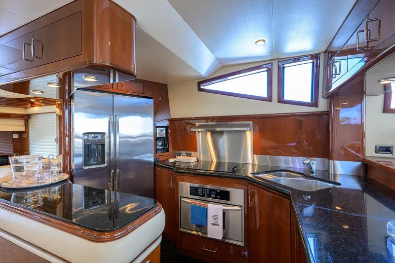 Slide: The Image of Luxurious kitchen interior of 2005 Marquis 65 MY yacht with modern appliances. - 11