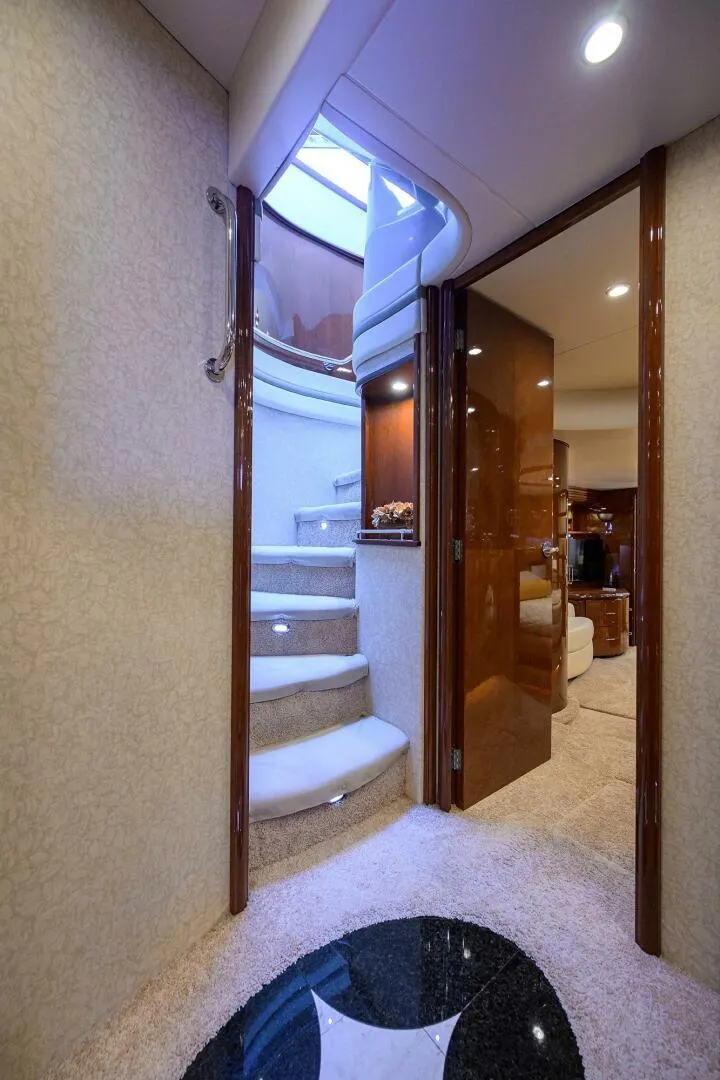 Slide: The Image of Interior of 2005 Marquis 65 MY yacht with elegant staircase and luxurious cabin. - 13
