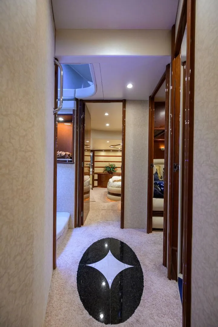 Slide: The Image of Luxurious interior hallway of 2005 Marquis 65 MY yacht with elegant decor. - 14