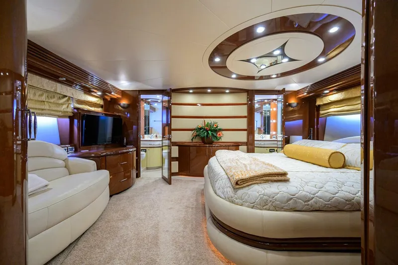 Slide: The Image of Luxurious interior of 2005 Marquis 65 MY yacht with elegant furnishings and ambient lighting. - 16