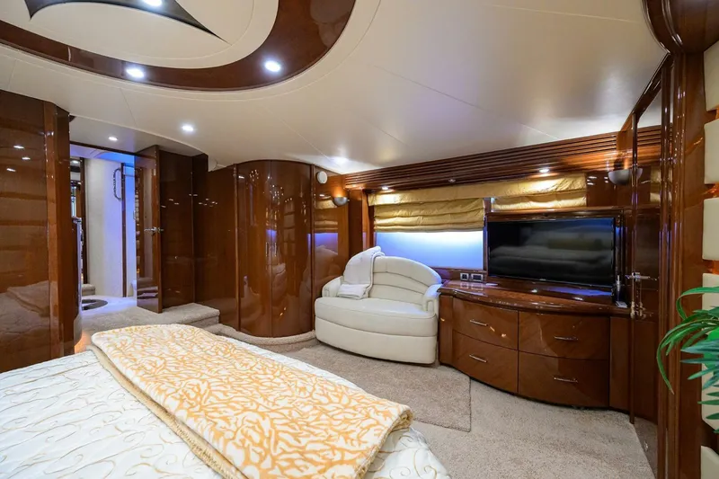 Slide: The Image of Luxurious interior of 2005 Marquis 65 MY yacht with elegant furnishings and modern amenities. - 18