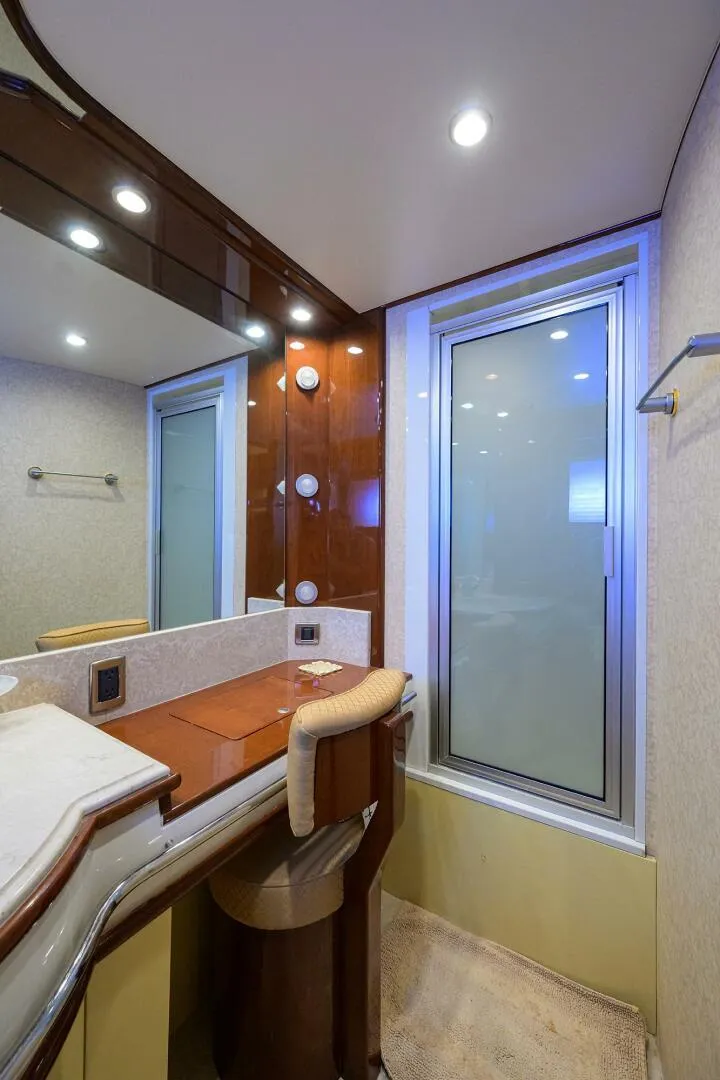 Slide: The Image of Luxurious bathroom in 2005 Marquis 65 MY yacht with modern fixtures and elegant design. - 20
