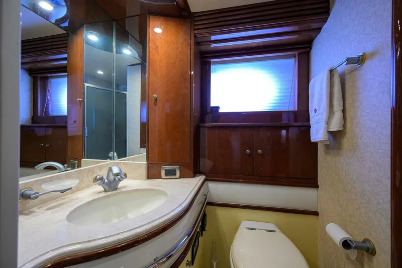 Slide: The Image of Luxurious bathroom in 2005 Marquis 65 MY yacht with elegant wood finishes. - 22