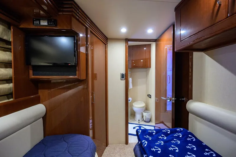 Slide: The Image of Luxurious 2005 Marquis 65 MY yacht cabin with cozy beds and modern amenities. - 27
