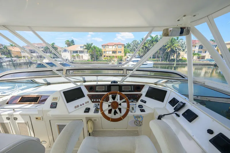 Slide: The Image of Interior view of 2005 Marquis 65 MY yacht cockpit with modern navigation equipment. - 39