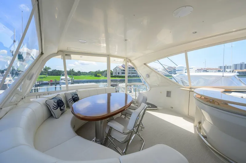 Slide: The Image of Luxurious interior of 2005 Marquis 65 MY yacht with elegant seating and table. - 41
