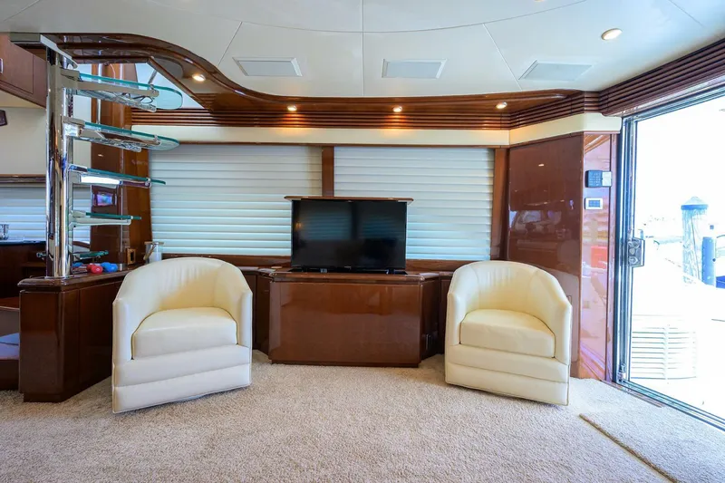 Slide: The Image of Luxurious 2005 Marquis 65 MY yacht interior with plush seating and modern decor. - 7