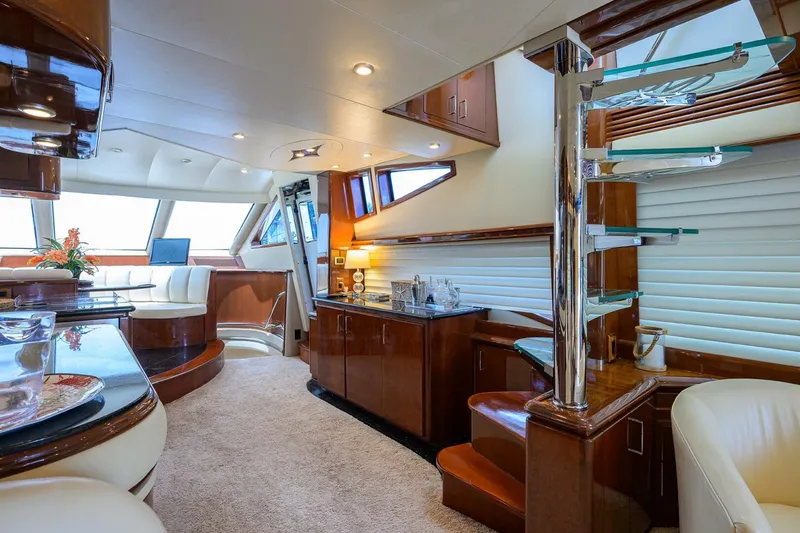 Slide: The Image of Luxurious interior of 2005 Marquis 65 MY yacht with elegant wood finishes and modern design. - 8