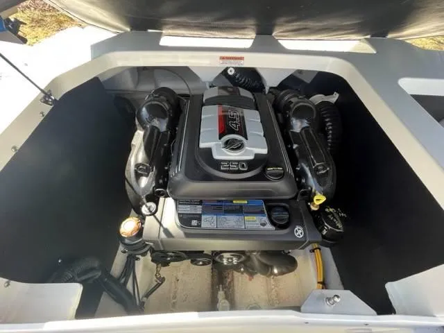 Slide: The Image of 2022 Monterey M22 engine compartment showcasing a powerful 250 horsepower engine. - 14