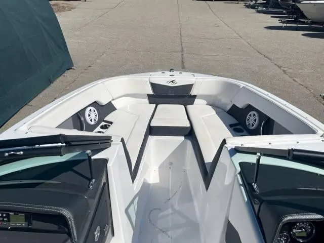 Slide: The Image of 2022 Monterey M22 boat interior with white seating and speakers. - 6