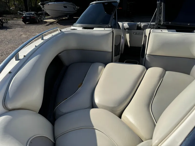 Slide: The Image of 2003 Malibu Wakesetter 23 XTi boat interior with white leather seating. - 6