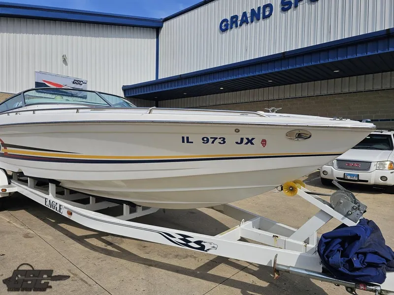 Slide: The Image of 2005 Formula 292 FASTech boat on trailer outside Grand Sport Center. - 16