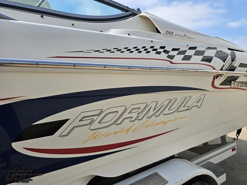 Slide: The Image of 2005 Formula 292 FASTech boat with racing graphics and "World Champion" text. - 23