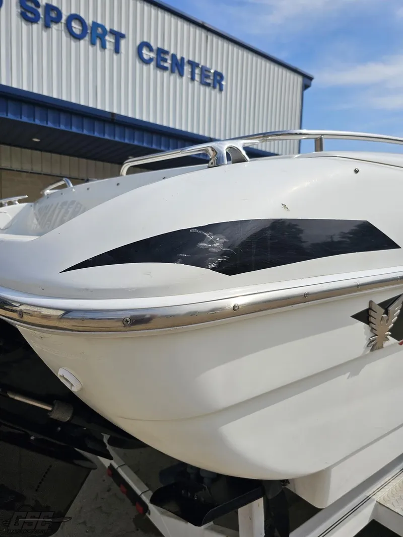 Slide: The Image of 2005 Formula 292 FASTech boat at a sports center, showcasing sleek design and detailing. - 34
