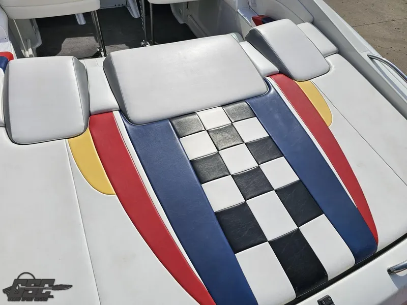 Slide: The Image of 2005 Formula 292 FASTech boat interior with colorful checkered upholstery design. - 36