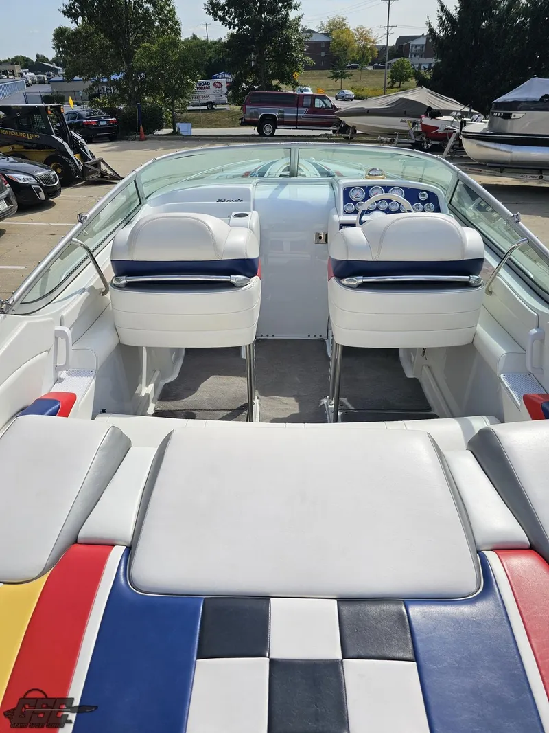 Slide: The Image of 2005 Formula 292 FASTech boat interior with colorful seating and dual helm chairs. - 38