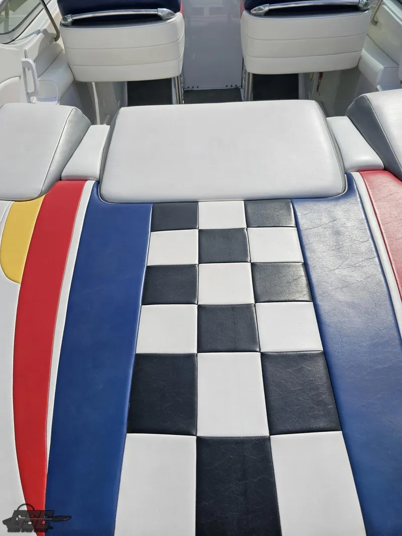 Slide: The Image of 2005 Formula 292 FASTech boat interior with colorful checkered upholstery design. - 40