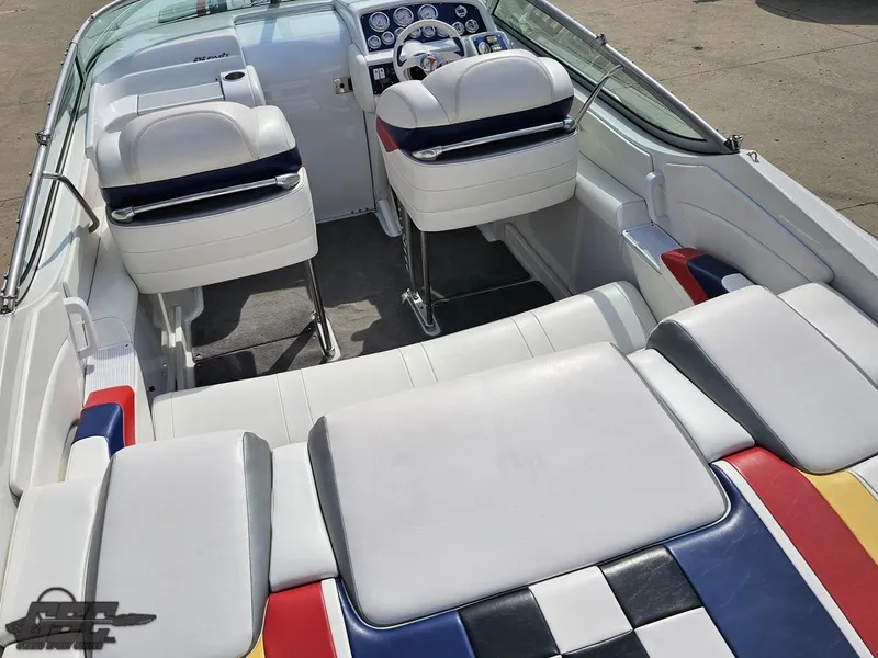 Slide: The Image of 2005 Formula 292 FASTech boat interior with colorful seating and modern dashboard. - 43