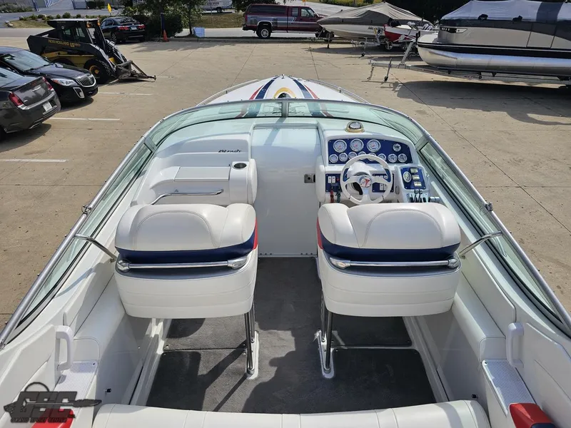 Slide: The Image of 2005 Formula 292 FASTech boat interior with dual seats and dashboard controls. - 45