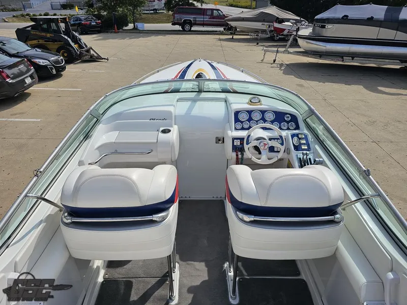 Slide: The Image of 2005 Formula 292 FASTech boat interior with dual seats and dashboard controls. - 46