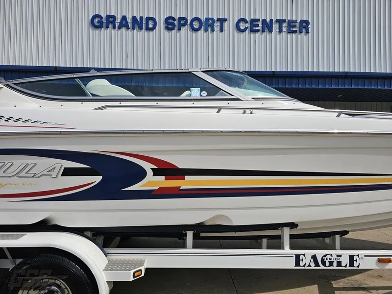 Slide: The Image of 2005 Formula 292 FASTech boat on trailer at Grand Sport Center. - 5