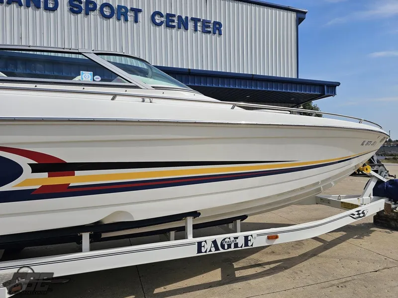 Slide: The Image of 2005 Formula 292 FASTech boat on trailer at sport center. - 6