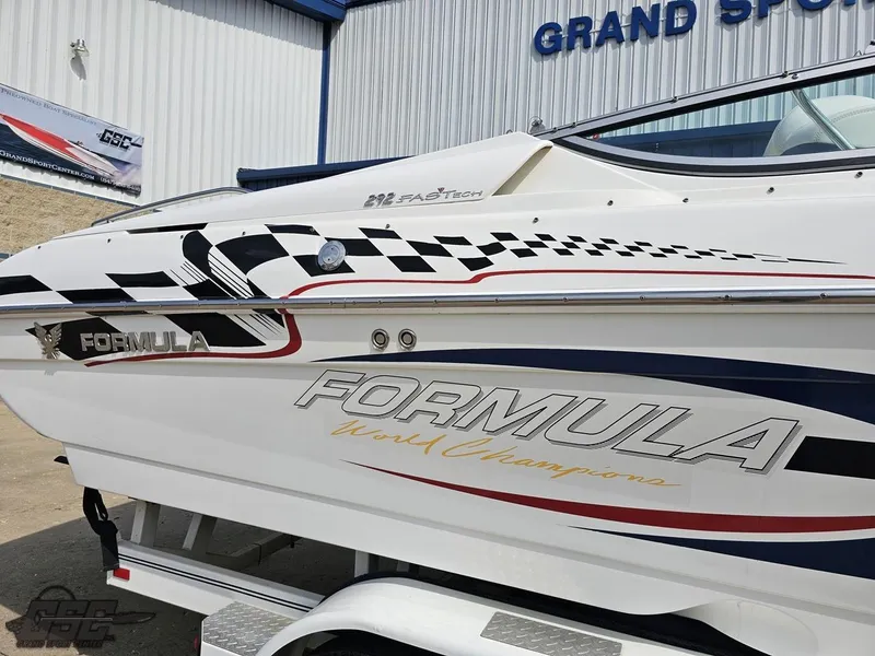 Slide: The Image of 2005 Formula 292 FASTech boat with racing graphics at Grand Sport Center. - 8