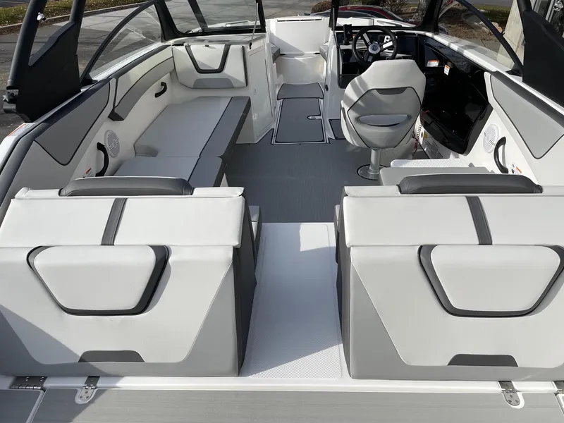 Slide: The Image of 2025 Yamaha Boats AR220 interior with modern seating and sleek design. - 5