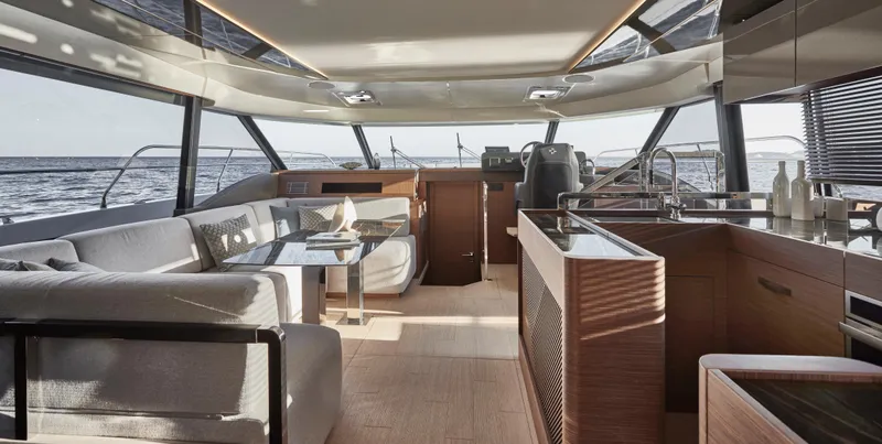 Slide: The Image of Luxurious interior of 2025 Prestige M48 yacht with modern furnishings and ocean view. - 18