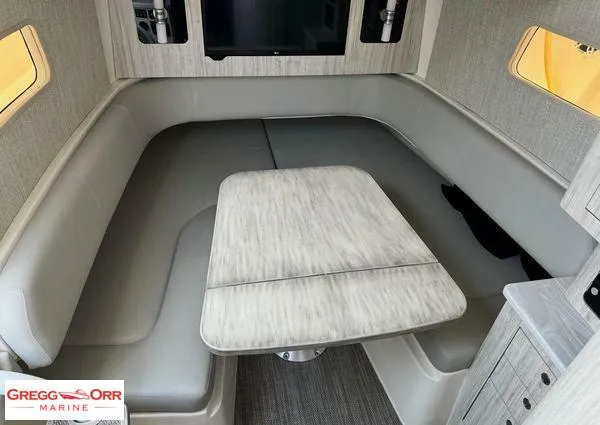 Slide: The Image of Luxurious interior of 2021 Regulator 41 boat with elegant seating and table. - 24