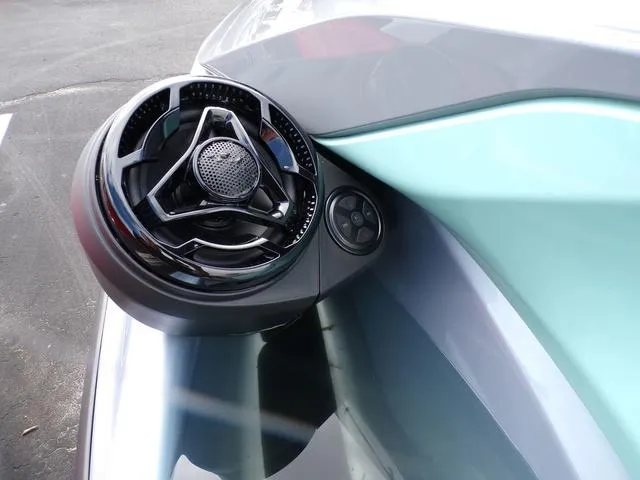 Slide: The Image of 2024 Sea-Doo Waverunner GTI speaker detail, sleek design, modern audio system. - 14