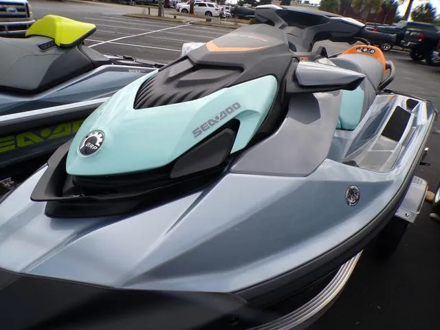 Slide: The Image of 2024 Sea-Doo Waverunner GTI in a parking lot, showcasing sleek design and vibrant colors. - 8