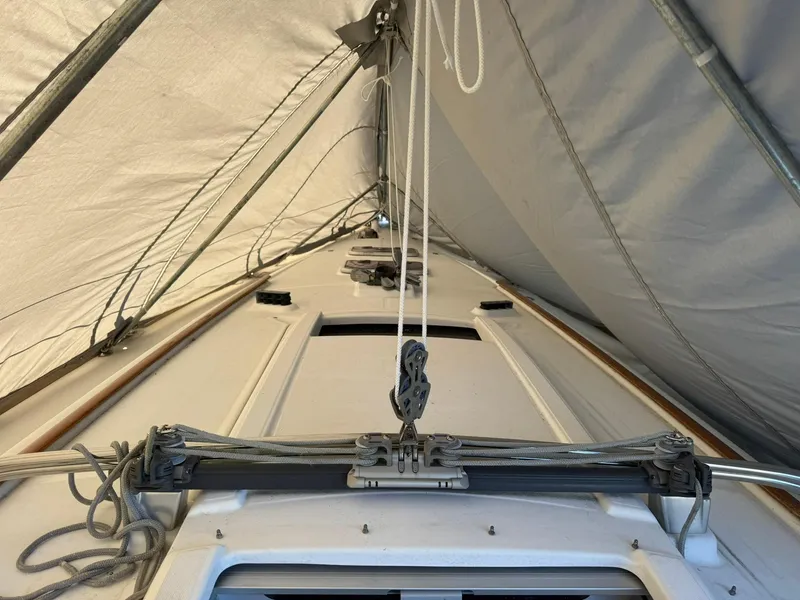 Slide: The Image of Beneteau Oceanis 34 sailboat deck under cover, 2013 model. - 13