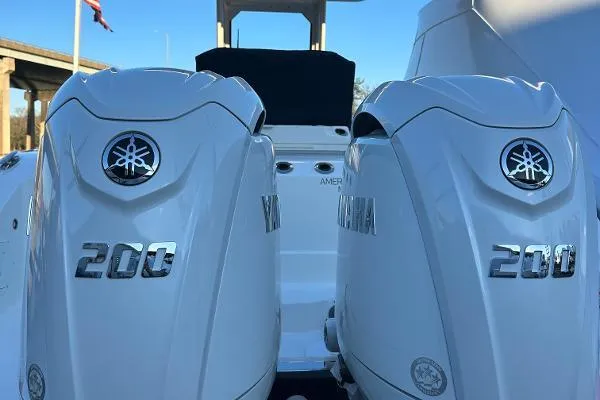 Slide: The Image of Twin Yamaha 200 engines on a 2025 Pursuit S 268 Sport boat. - 6