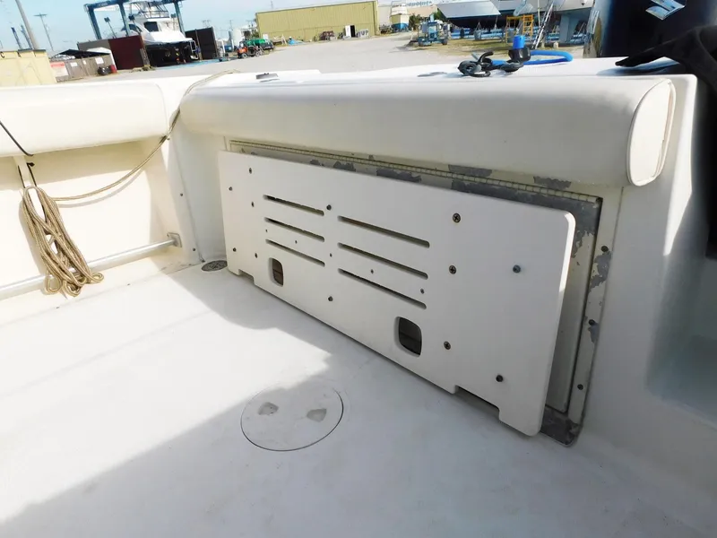 Slide: The Image of 2004 Hydra-Sports Vector 2400 CC boat interior with storage compartment. - 14