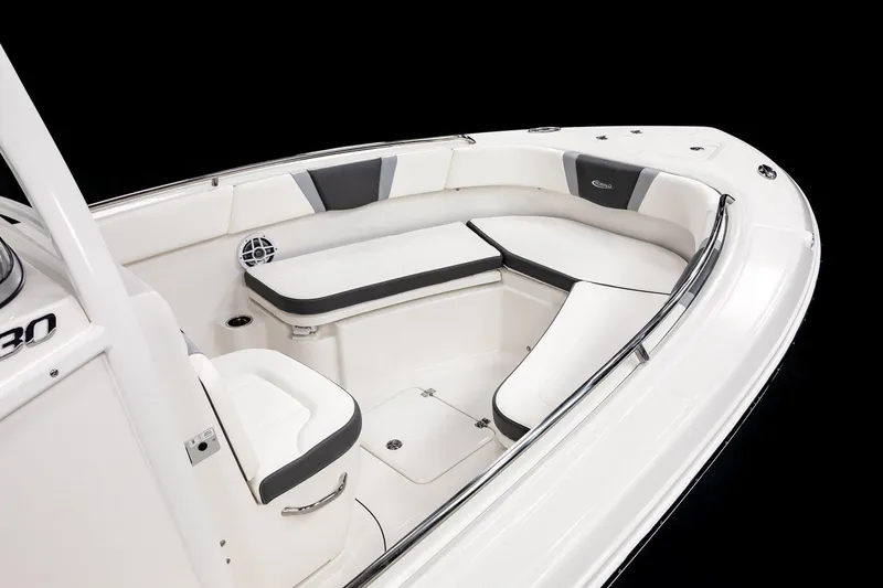 Slide: The Image of 2025 Robalo R230 Center Console boat interior with cushioned seating. - 9