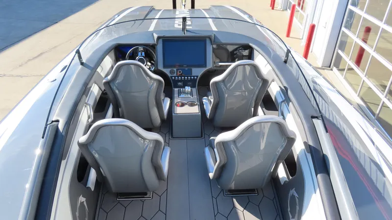 Slide: The Image of 2023 Fountain 34 Thundercat interior with sleek seating and modern dashboard. - 6