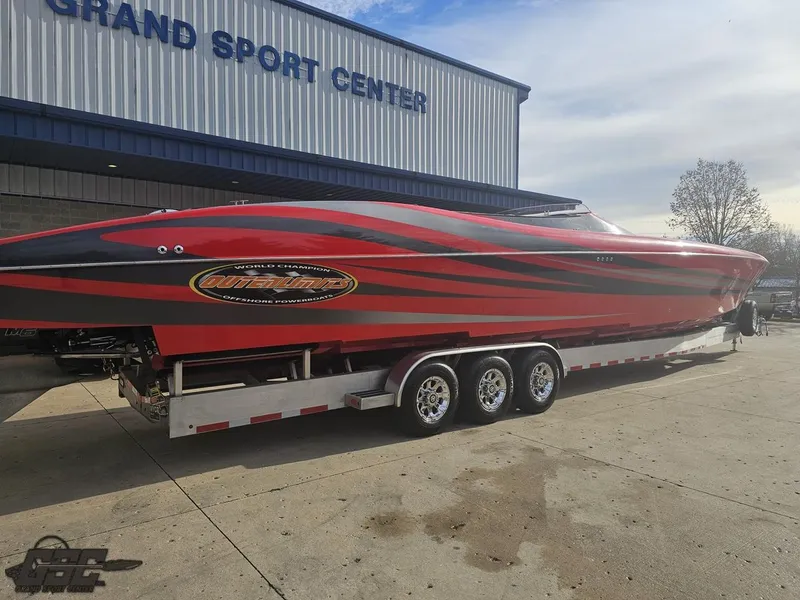 Slide: The Image of 2010 Outerlimits 52 SL powerboat on trailer at Grand Sport Center. - 13