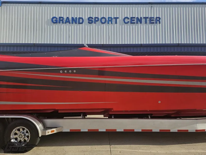 Slide: The Image of Red 2010 Outerlimits 52 SL boat at Grand Sport Center. - 3