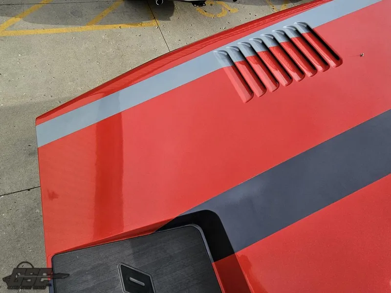 Slide: The Image of Red and gray 2010 Outerlimits 52 SL boat deck with sleek design details. - 48