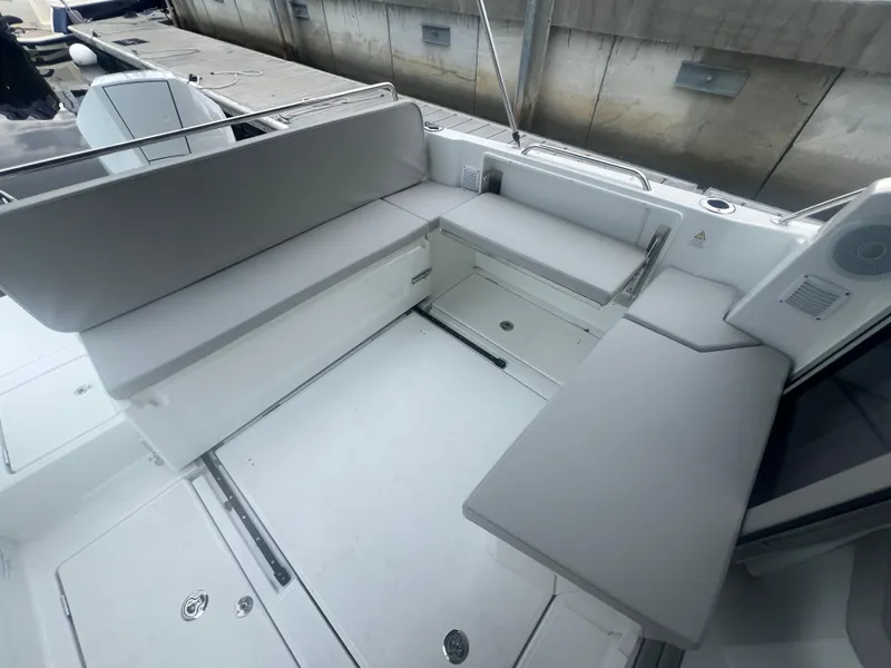 Slide: The Image of 2025 Beneteau Antares 8 boat interior with sleek seating and modern design. - 6
