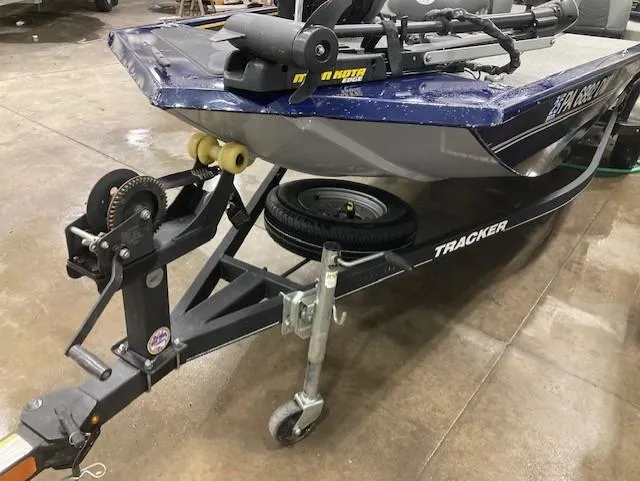 Slide: The Image of 2019 Tracker Pro 170 boat on trailer in garage setting. - 9