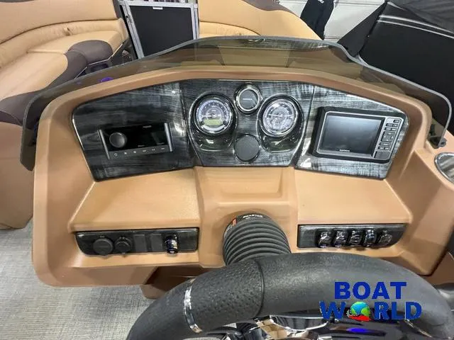 Slide: The Image of 2025 Tahoe LTZ 2385 Cruise dashboard with modern controls and gauges. - 13