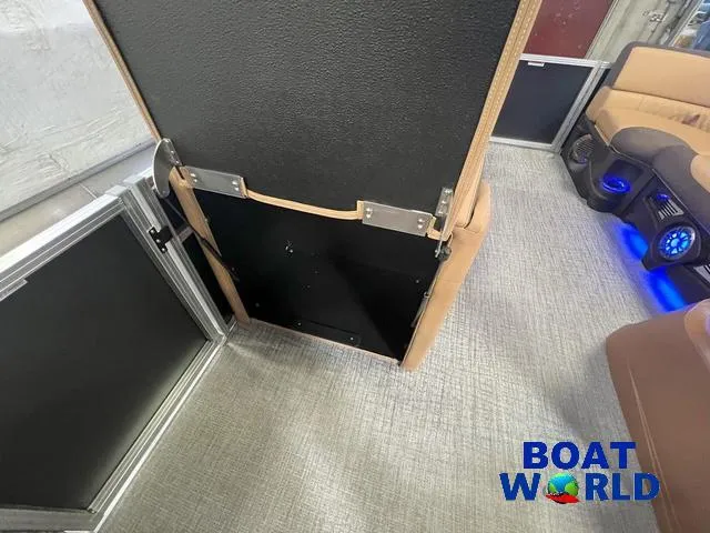 Slide: The Image of Interior of 2025 Tahoe LTZ 2385 Cruise Tritoon with rear bench seating. - 22