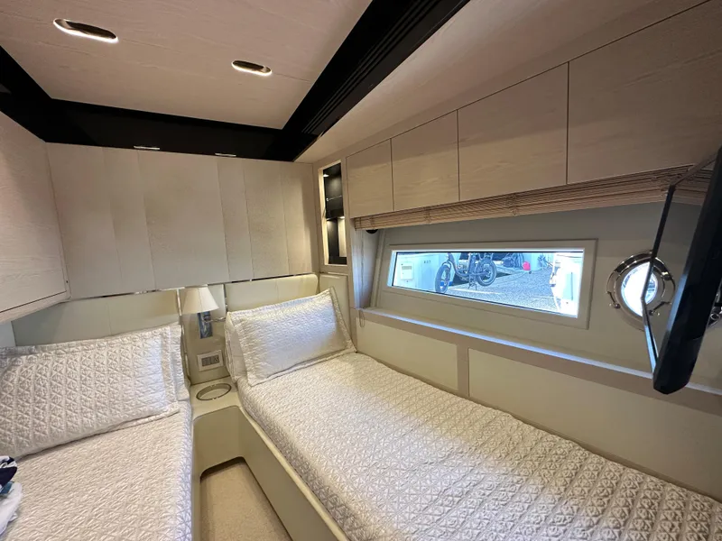 Slide: The Image of Luxurious 2015 Azimut 80 Flybridge cabin with twin beds and modern decor. - 40