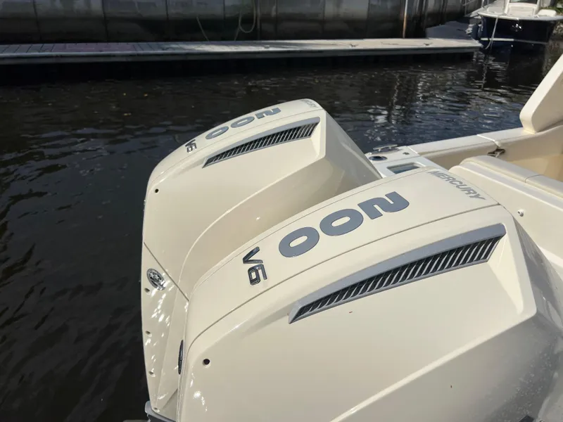 Slide: The Image of Twin Mercury V6 outboard engines on a 2025 Scout 277 Dorado boat. - 29