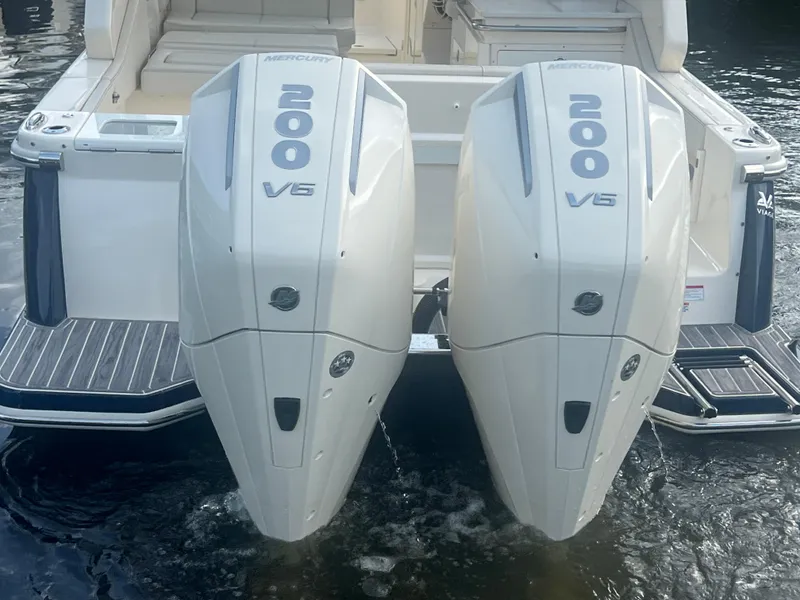 Slide: The Image of Twin Mercury 200 V6 engines on a 2025 Scout 277 Dorado boat. - 6